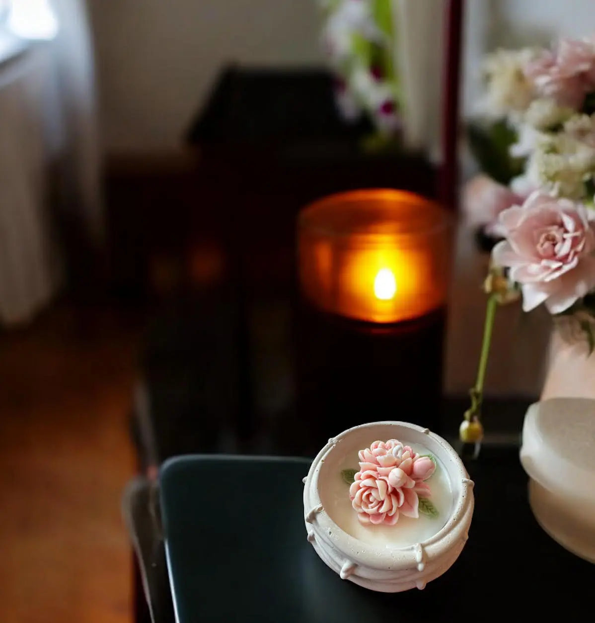 Pink floral home décor candle