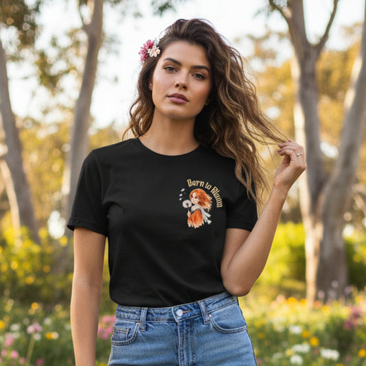 Black t-shirt with a graphic design of a woman holding flowers and 'Born to Bloom' text on a white background.