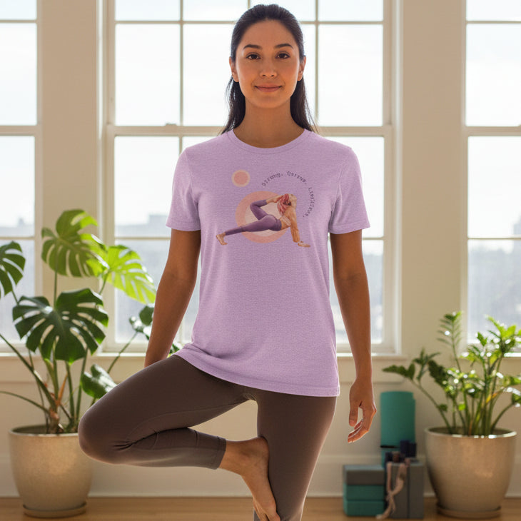 Purple t-shirt with a graphic of a person in a yoga pose and text on a white background
