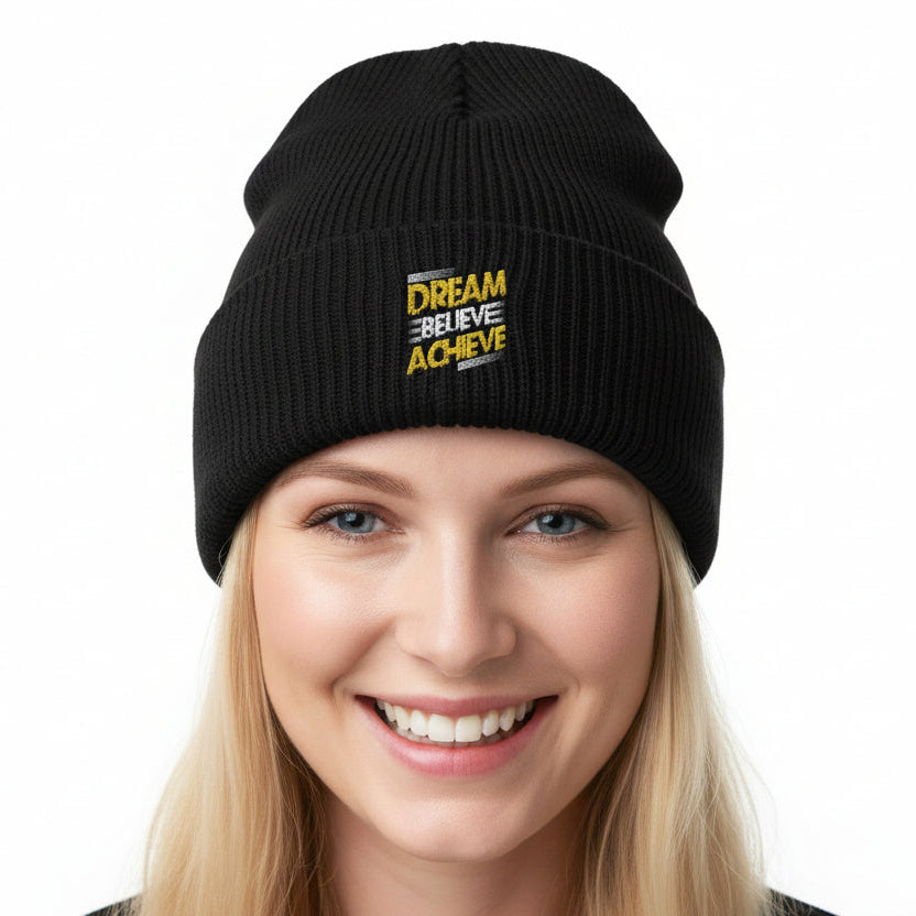 Black beanie with 'Dream Believe Achieve' text on a white background