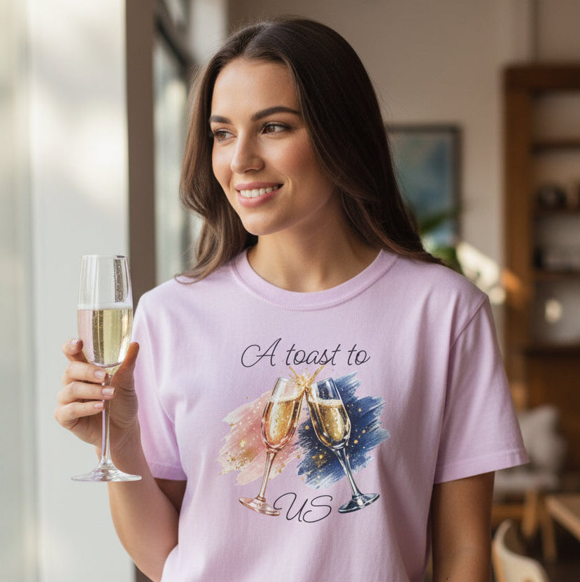 Light purple t-shirt with champagne glass design and text on a white background